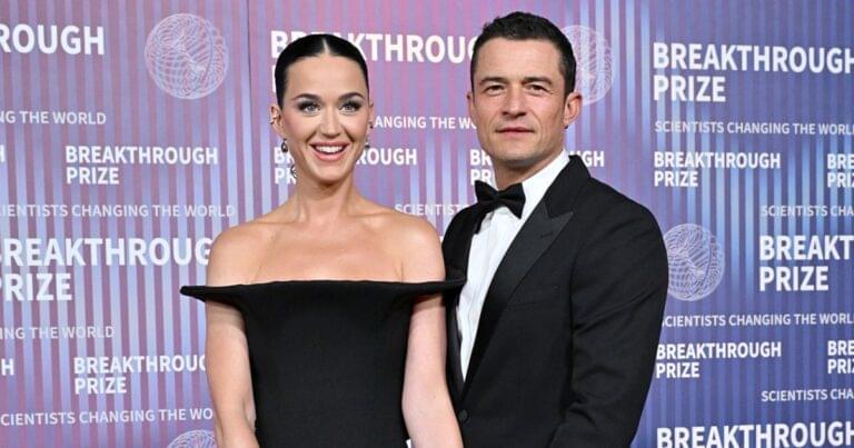 Katy Perry and Orlando Bloom hold hands at the Breakthrough Awards